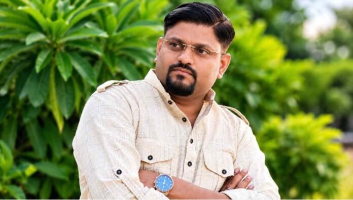 Abhishek Kumar Tripathi founder of MG Construction standing on a residential development site
